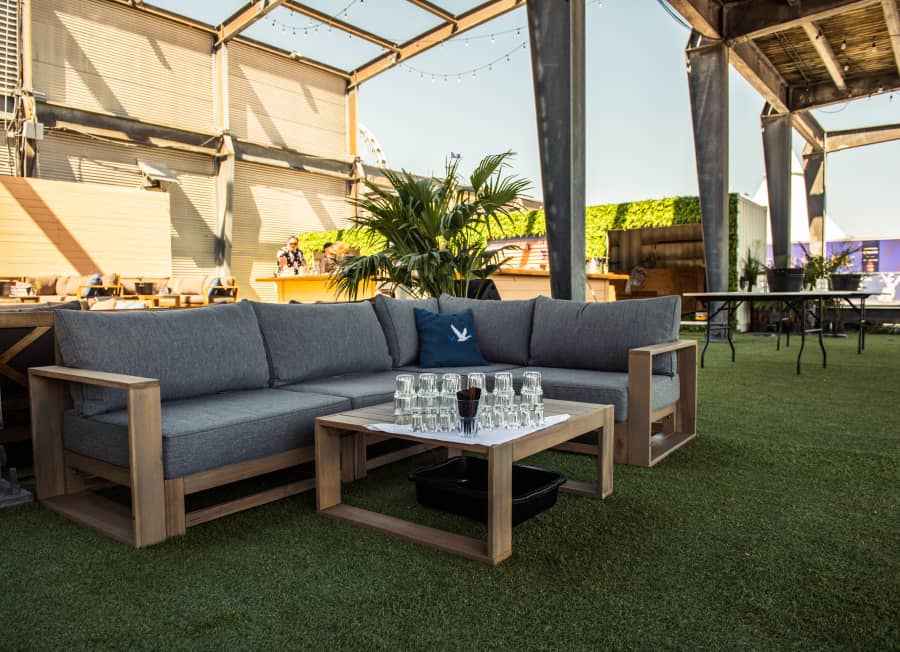 A couch in the outdoor lounge of Boa Vida